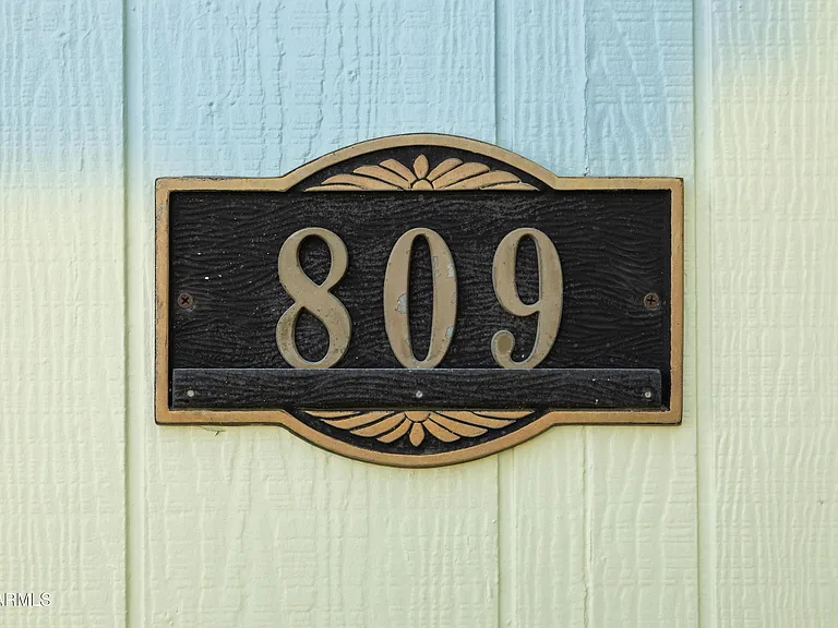 The 809 address plaque